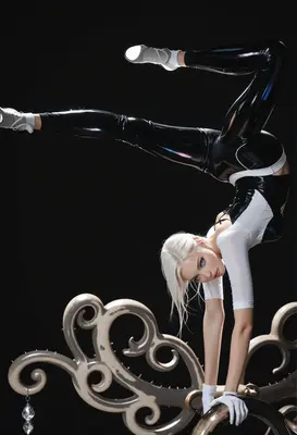 Acrobatic Performer in Latex Suit
