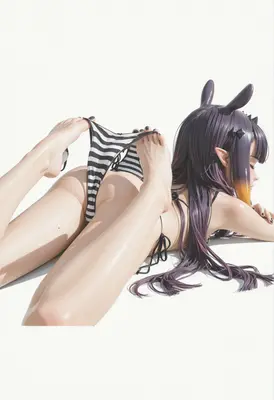 Ina Lying Down in Striped Bikini